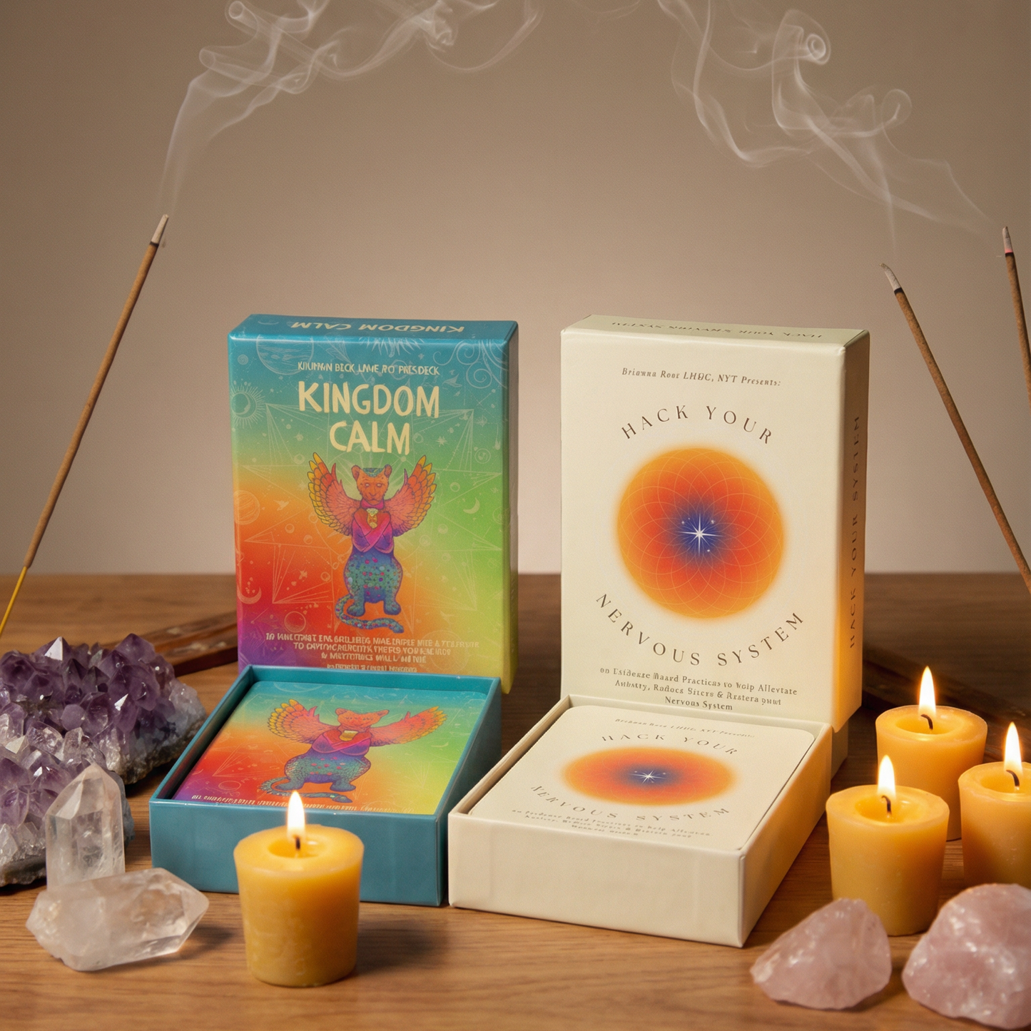 Candle, books, and incense on a wooden surface with smoke in the background