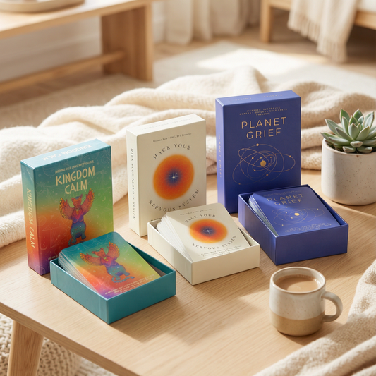 Colorful card boxes on a wooden table in a cozy living room.